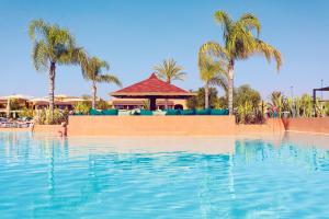 Bazén v ubytování Hotel Riu Tikida Palmeraie - All Inclusive nebo v jeho okolí