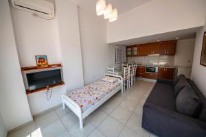 Kuchyň nebo kuchyňský kout v ubytování Apartments Cikuli