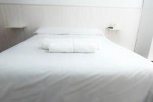 Postel nebo postele na pokoji v ubytování Hostal Jaufil