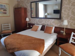 Voodi või voodid majutusasutuse Hotel Johannes Vermeer Delft toas