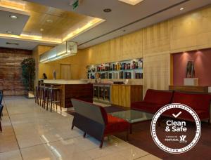 a lobby at a clean and safe restaurant at VIP Executive Entrecampos Hotel in Lisbon