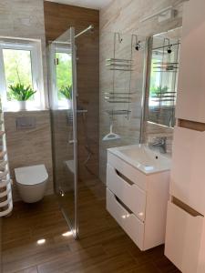ห้องน้ำของ Apartament Słoneczny Mielno - 365PAM