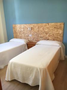 Posteľ alebo postele v izbe v ubytovaní Apartamentos Satse Moncofa