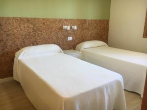 Posteľ alebo postele v izbe v ubytovaní Apartamentos Satse Moncofa