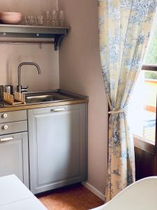Kuchyň nebo kuchyňský kout v ubytování Locanda dei Sette Limoni - camere e residence