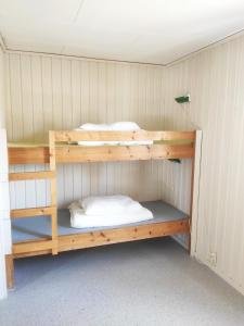 Postel nebo postele na pokoji v ubytování Målselvfossen Feriesenter