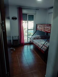 Postel nebo postele na pokoji v ubytování Faro II Holiday Home + 34 fotografií