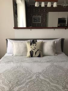 
Кровать или кровати в номере Апартаменты у Кристалла
