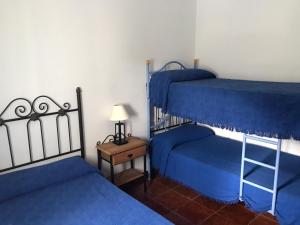 Postel nebo postele na pokoji v ubytování Casa Los Pérez