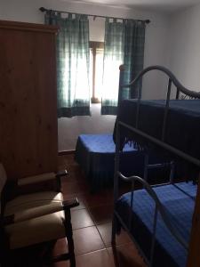 Postel nebo postele na pokoji v ubytování Casa Los Pérez