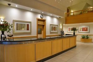 a lobby of a hospital with a reception counter at Road Lodge Sandton in Johannesburg