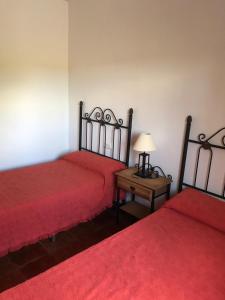 Postel nebo postele na pokoji v ubytování Casa Los Pérez