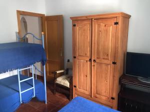 Postel nebo postele na pokoji v ubytování Casa Los Pérez