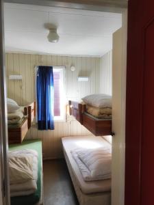 Postel nebo postele na pokoji v ubytování Målselvfossen Feriesenter + 37 fotografií