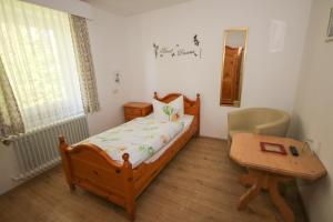 Postel nebo postele na pokoji v ubytování Hotel Charlott