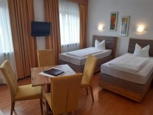 Posteľ alebo postele v izbe v ubytovaní Landhaus Klausnerhof Hotel Garni