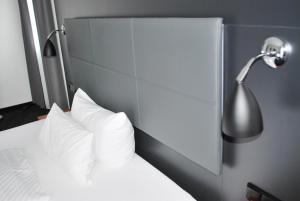 Postel nebo postele na pokoji v ubytování Hotel zum Rössel