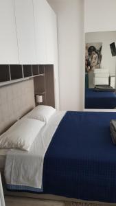 Posteľ alebo postele v izbe v ubytovaní Residenza sul Mare
