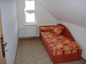 מיטה או מיטות בחדר ב-Penzion "Apartmány U Semušky"