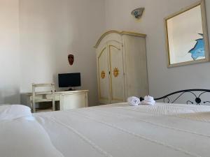 Кровать или кровати в номере Hotel La Ciaccia