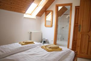 Cama o camas de una habitación en Wagner Panzió