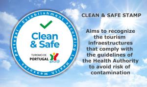 a sign that says clean and safe against a cloudy sky at Light-Filled, Fully Renovated Apt near Belém, By TimeCooler in Lisbon