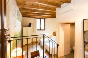 Postel nebo postele na pokoji v ubytování B&B Corte delle Muse