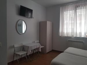 Postel nebo postele na pokoji v ubytování Pensión Atxiki