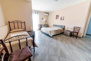 Voodi või voodid majutusasutuse Etna - Monte - Mojo toas