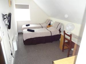 Cama ou camas em um quarto em Travellers Rest Motel