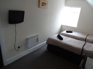 Cama ou camas em um quarto em Travellers Rest Motel