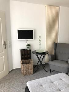 TV a/nebo společenská místnost v ubytování Apartment in Wiek