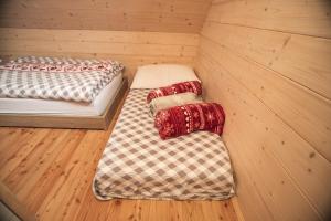 Voodi või voodid majutusasutuse Velika Planina - Chalet Rušovc - Location with fully privacy toas