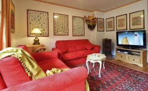 Telewizja i/lub zestaw kina domowego w obiekcie Family Apartment FUCHS Bad Kleinkirchheim