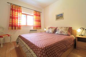 Łóżko lub łóżka w pokoju w obiekcie Family Apartment FUCHS Bad Kleinkirchheim