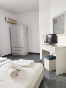 Postel nebo postele na pokoji v ubytování Atrium Apartment #2