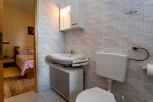 Koupelna v ubytování Apartmani Jurman
