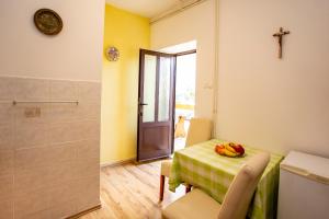 Postel nebo postele na pokoji v ubytování Apartmani Jurman