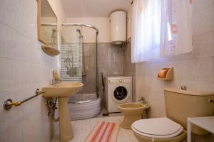 Koupelna v ubytování Apartmani Jurman