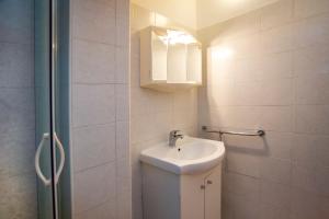 Koupelna v ubytování Apartmani Jurman