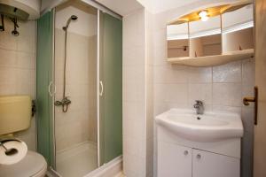Koupelna v ubytování Apartmani Jurman