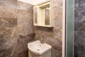 Koupelna v ubytování Apartmani Jurman