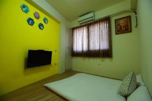 TV o dispositivi per l'intrattenimento presso 影拾光民宿Shadow of Light B&B