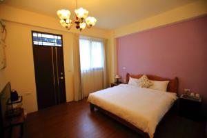 Letto o letti in una camera di 影拾光民宿Shadow of Light B&B