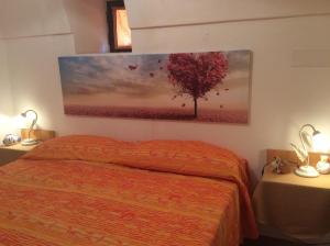 Postel nebo postele na pokoji v ubytování Dammuso Beatrice