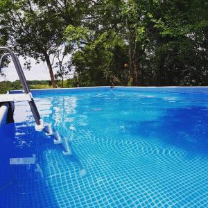 The swimming pool at or close to Camping d'artagnan