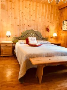 Ένα ή περισσότερα κρεβάτια σε δωμάτιο στο Appartamenti Pichler