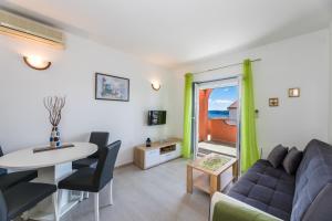 Posezení v ubytování Apartments Mikanović