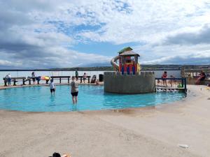 people in the water at a water park at Tranquility Portstewart in Portstewart