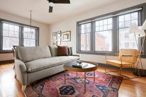 a living room filled with furniture and a window at Sonder The Essex in Denver